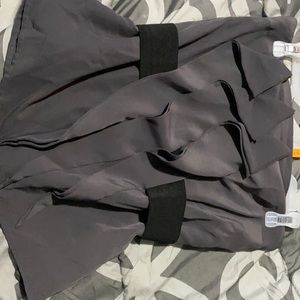 Sleeveless top with built in belt